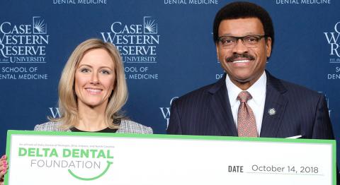 imberly Garland, Delta Dental, and Dr. Kenneth Chance, Dean of the School of Dental Medicine