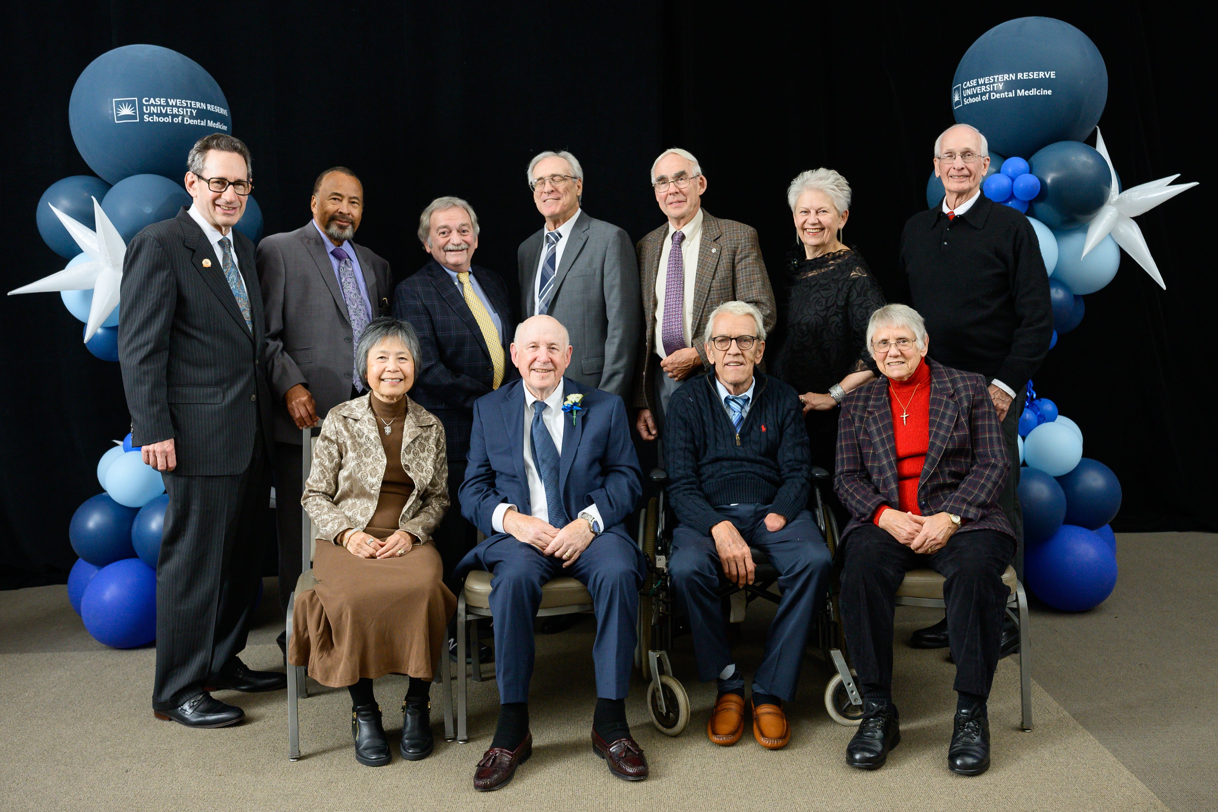 Eleven members of the newest Grand Class of 1976.