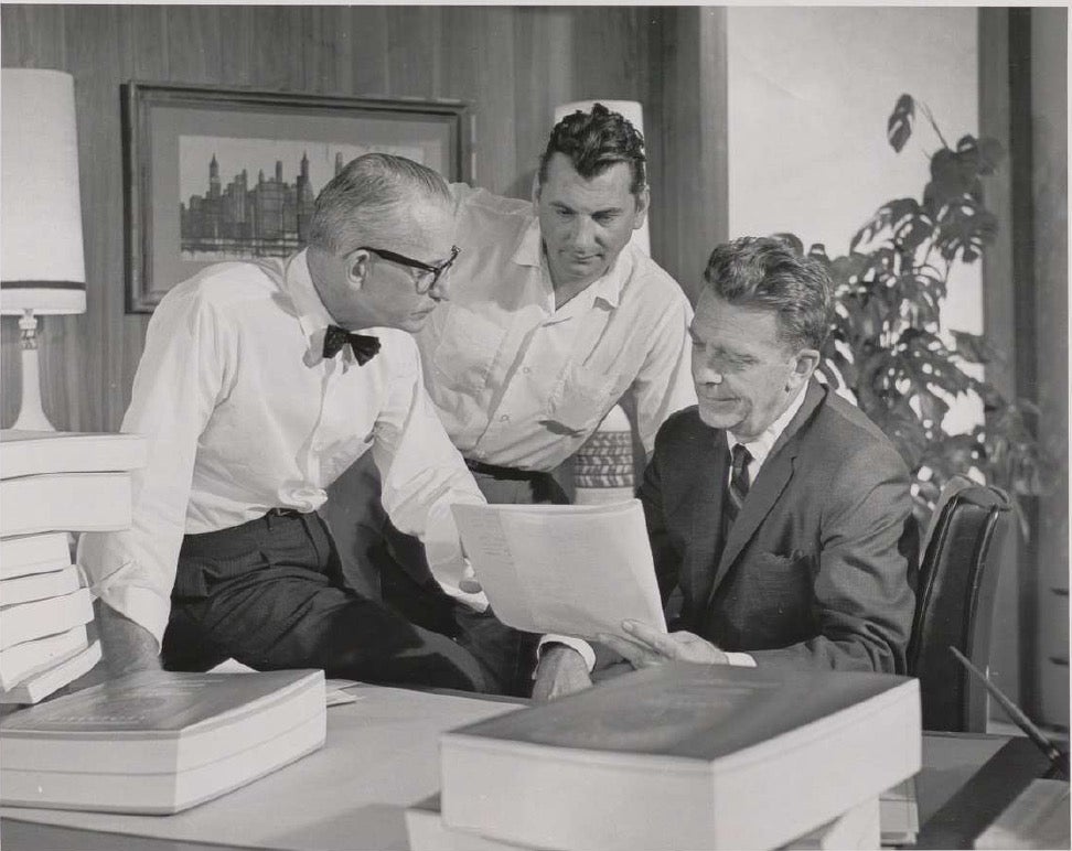 A production photo from “The Key to the City” (1963) with (left to right) Ray Culley, President of Cinecraft, Julius Potocsny, Chet Huntley