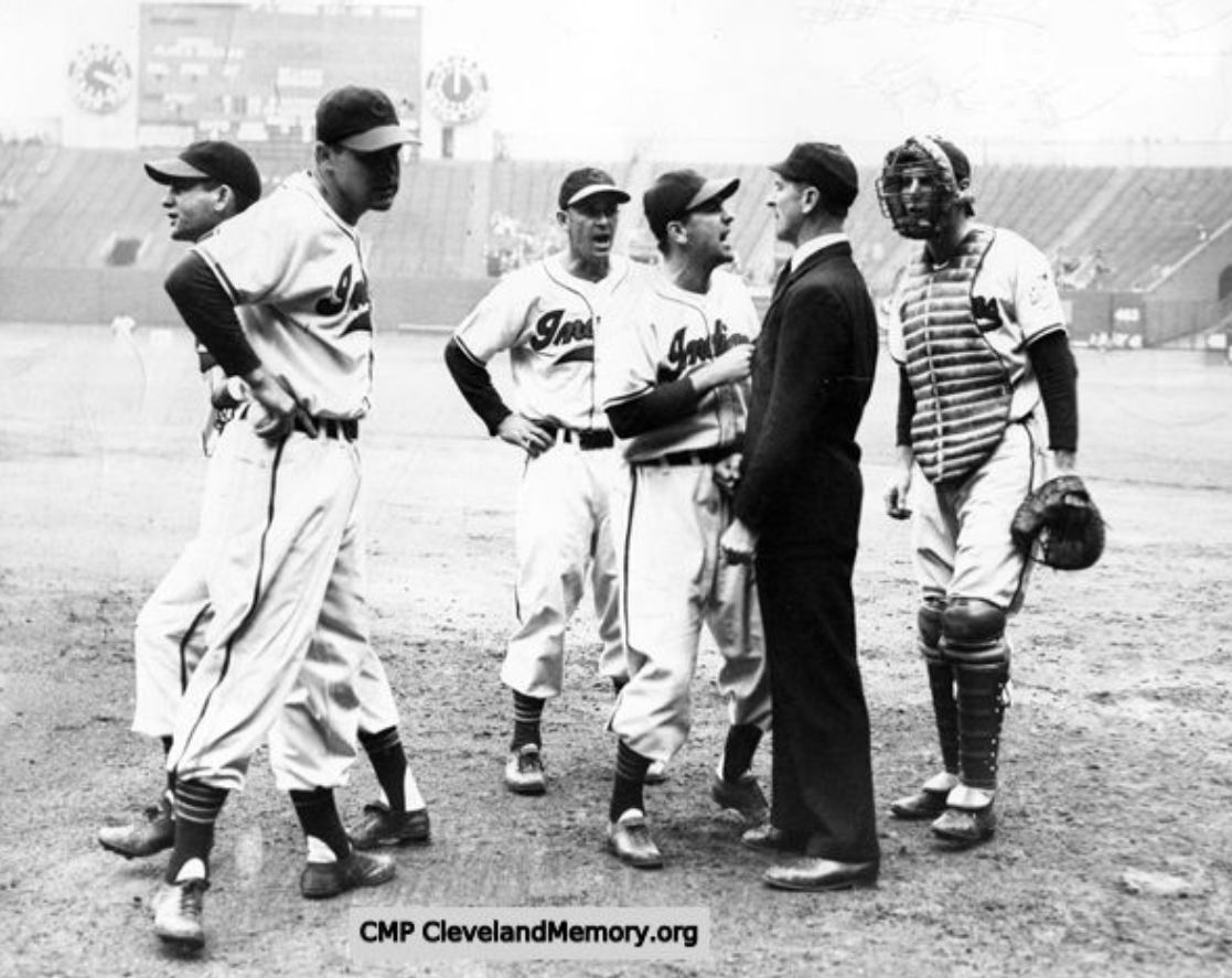 Cleveland player-manager Lou Boudreau argues with umpire Bill McKinley, 1948. From left to right: Bob Lemon, Eddie Robinson, Joe Gordon, Lou Boudreau, Ump. Bill McKinley and Jim Hegan.