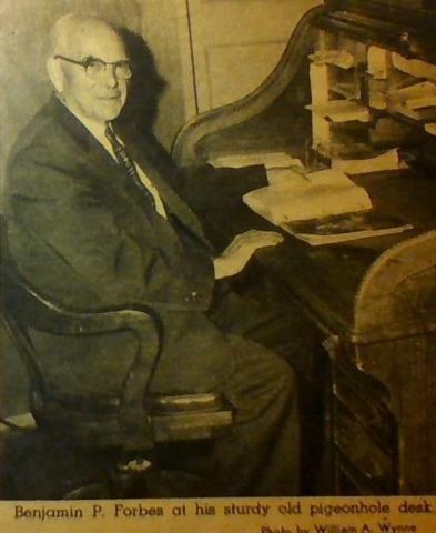 Black and White Photo of Benjamin P. Forbes Sitting at his desk
