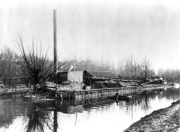 The Charcoal Plant of the Austin Powder Company stands  near the Five Mile Lock of the Ohio-Erie Canal, ca. 1870. The facility exploded in 1907. WRHS