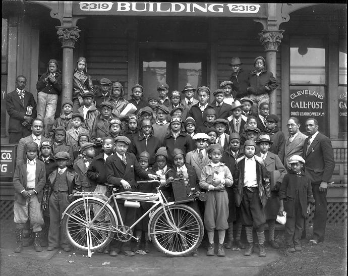 African-American newsboys gather in front of the Call & Post building, home to Cleveland