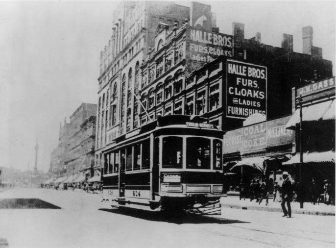 A streetcar stops in front of the early Euclid Ave. location of Halle Bros. Department Store, ca. 1900. WRHS.