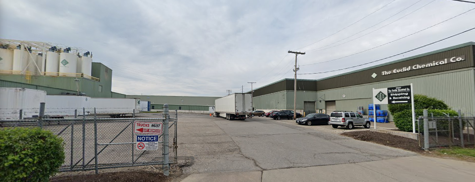 A color photograph of the modern entrance to Euclid Chemical at 19001 Cochran Avenue