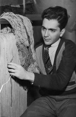 This photograph from 30 December 1940 shows Vahe Gulbenkian repairing such a rug on a loom at 12551 Euclid Ave.