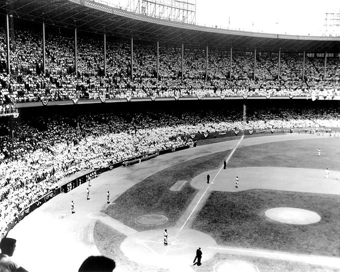 The crowd and players stand for the National Anthem at the 1954 All Star Game held at Cleveland