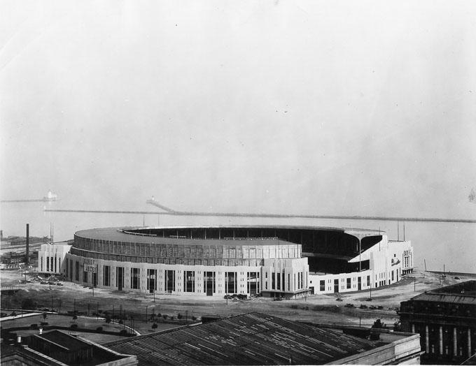 Cleveland Municipal Stadium shortly after its completion with Lake Erie in the background.