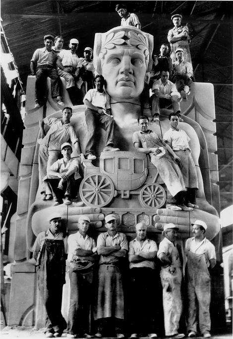 Stone carvers pose in their workshop on a sculptural pylon for the Lorain-Carnegie Bridge, later renamed the Hope Memorial Bridge, ca. 1931. WRHS.