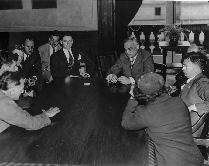 Mayor Harold Burton and Safety Director Eliot Ness meet with the Steel Workers