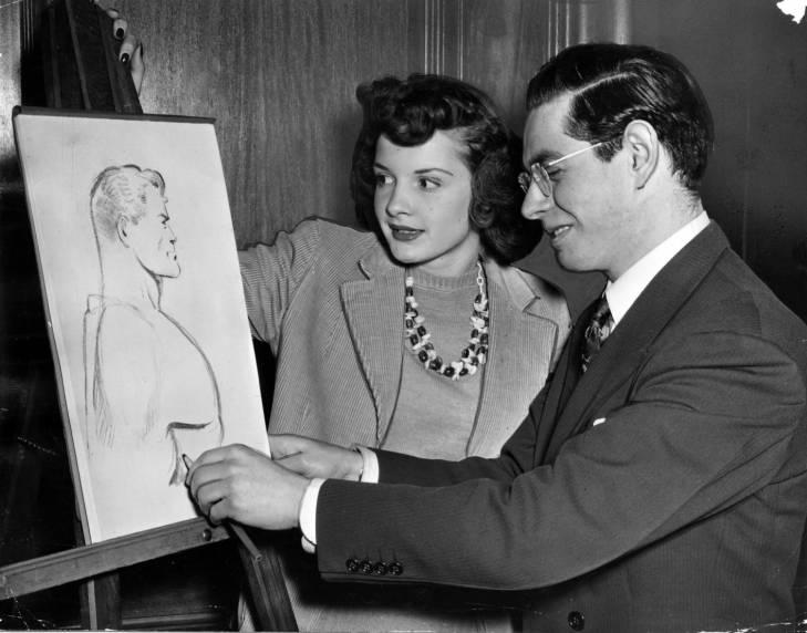 Joe Shuster, one of Superman's two creators, attends a freehand drawing course at Fenn College taught by Cleveland artist Hans Busch in 1942. At Shuster's left is fellow student Marian Henderson.