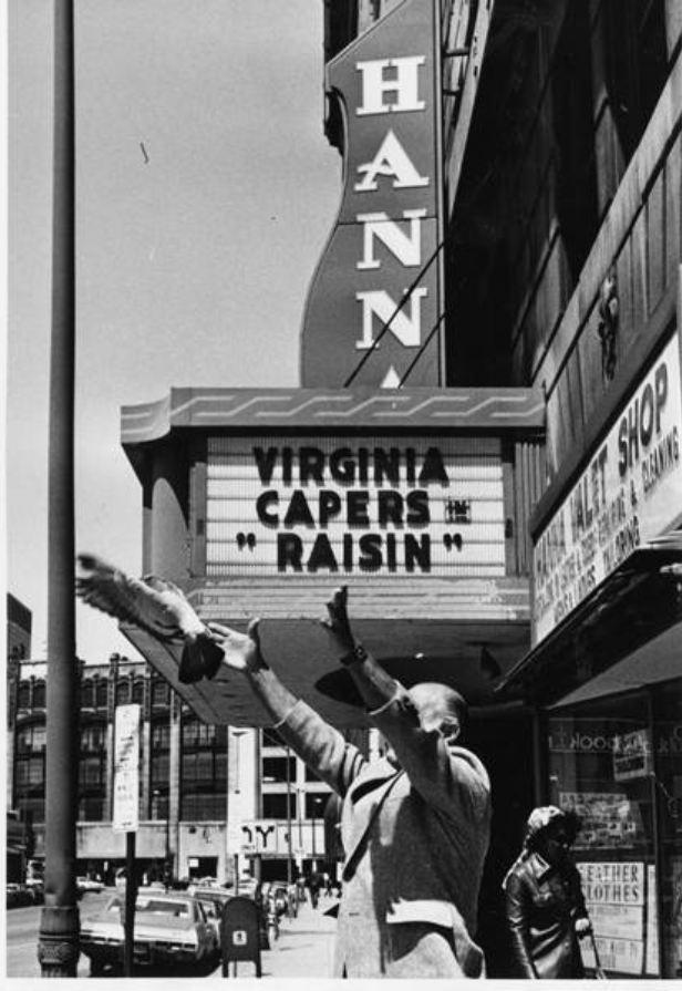 In front of the Hanna Theater, Milton Krantz, "Mr. First-Nighter," releases a homing pigeon on 6 May 1976