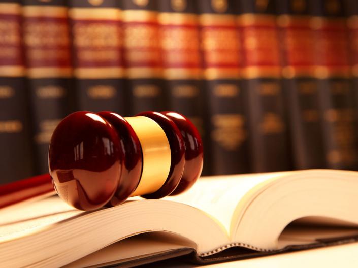 Gavel resting on an open book