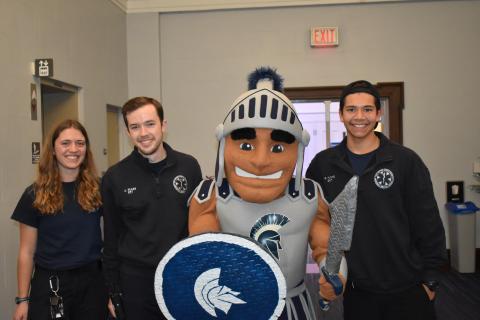 CWRU EMS members pictured with spartie 
