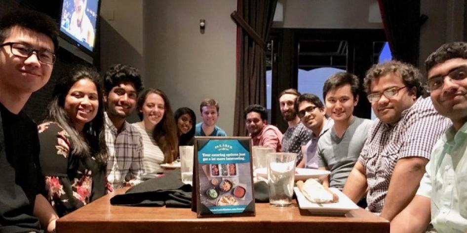 Group of peers sitting around a table