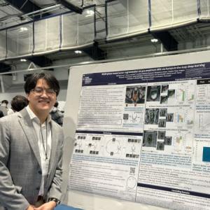 Michael Kong with poster presentation