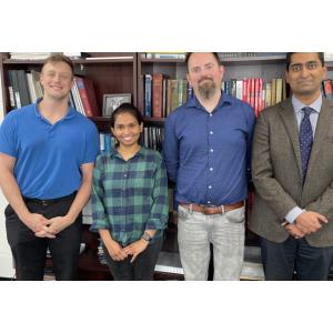 Rohan Akolkar with some of his research team