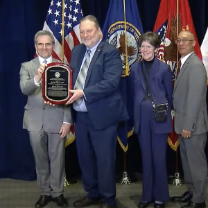Robert Kirsch receives the Magnuson Award
