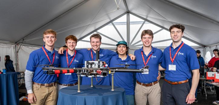 Winning team of students with their drone