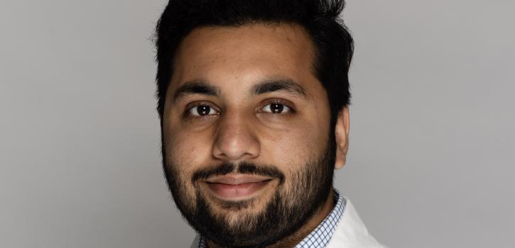 Muhammad Haroon in lab coat
