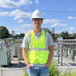 Andrew Smith working in the field for his internship