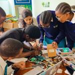 Group of young students working on a project