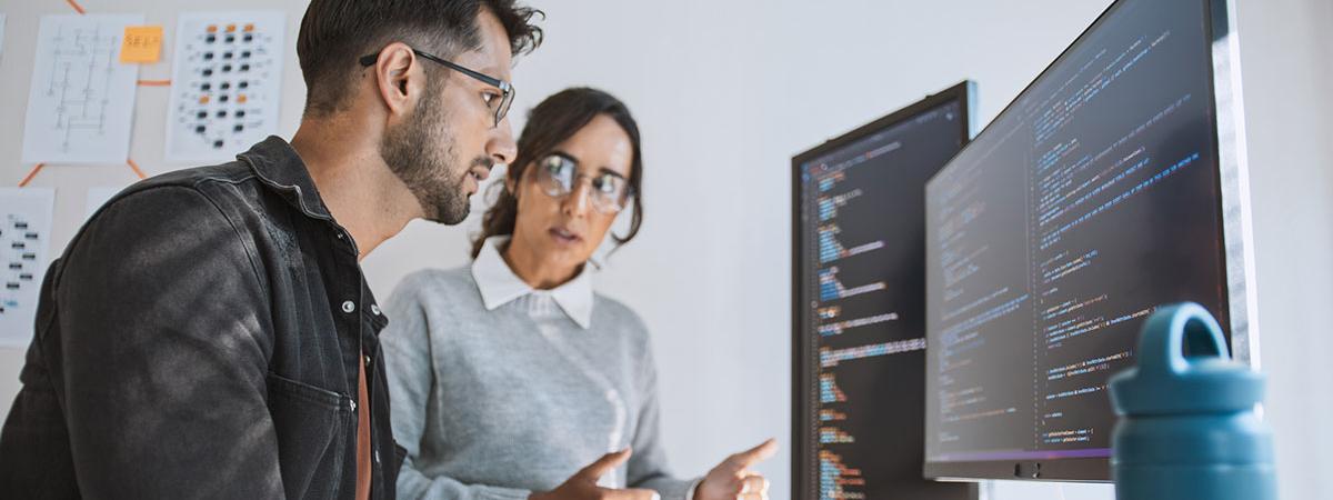 two people looking at a computer screen