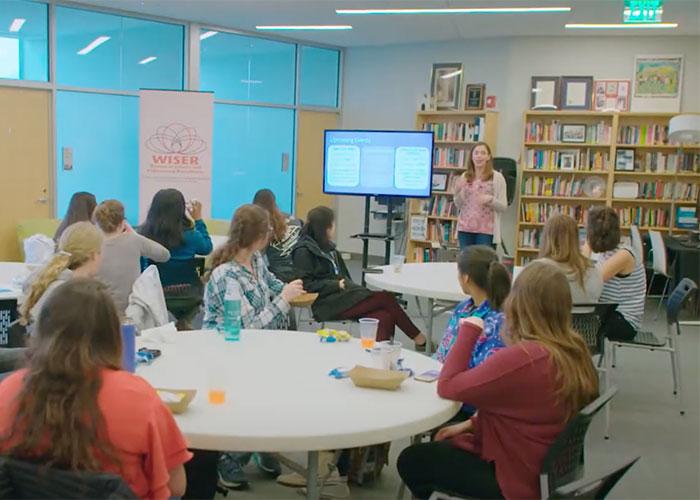 Women meeting in a library