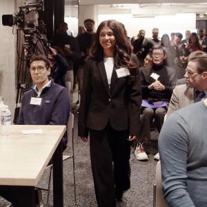 Krupa Venkatesan from eLEXir walks up to receive her prize at MPSC