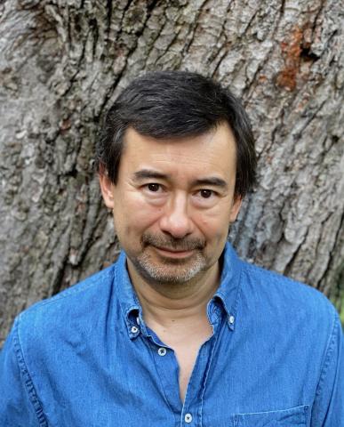 Author Peter Ho Davies in blue denim shirt 