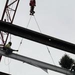 crane hoists final beam of Case Western Reserve University's Interdisciplinary Science and Engineering Building into place