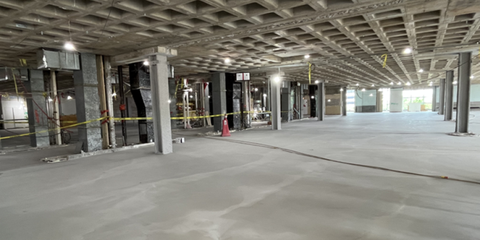 Picture of the interior of the Robbins Building, showing construction on the fourth floor.