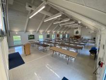 The November Meeting Center's main room in classroom setup