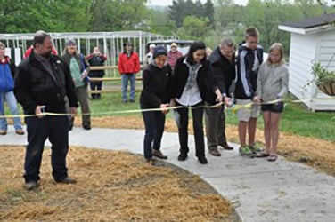 Ribbon cutting for opening of CWRU A.I. Root Observational Apiary and Pollinator Garden 