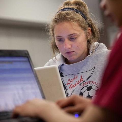 Student sitting at laptop
