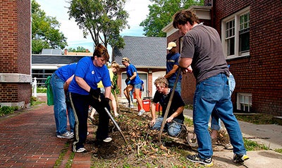 CWRU students and community members doing landscaping during Case for Community Day