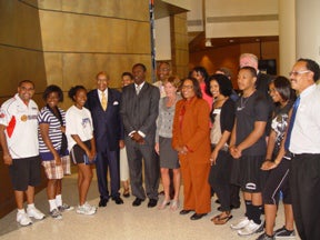 Congresswoman Marcia L. Fudge and former Congressman Louis Stokes with CWRU President Barbara R. Synder with representatives of the National Youth Sports Program at Case Western Reserve University