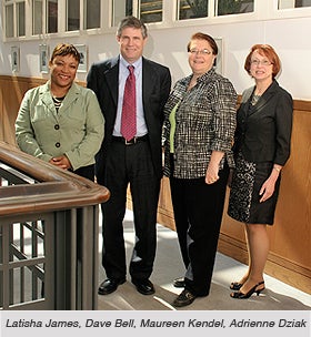 Hallway photo of Latisha James, Dave Bell, Maureen Kendel and Adrienne Dziak of CWRU Office of Government & Community Relations