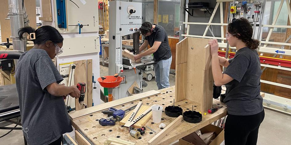 Students woodworking in think[box].