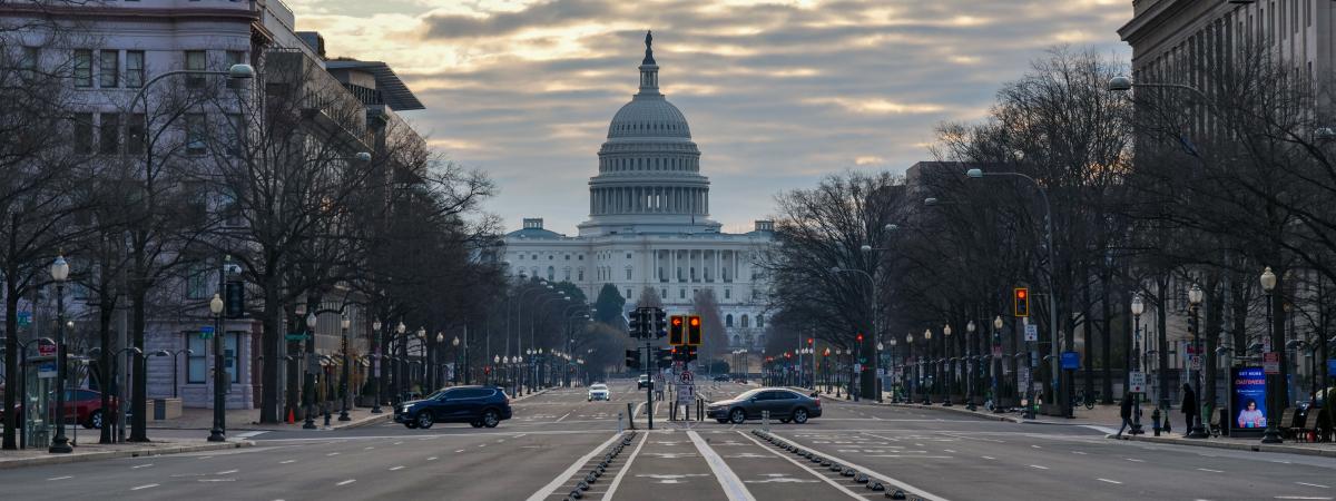 US Capitol from a distance at sunrise