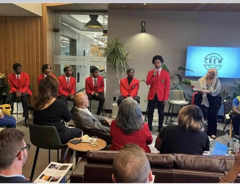 CREW Foundation student speaking to audience