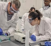 YES Program participant watching an experiment