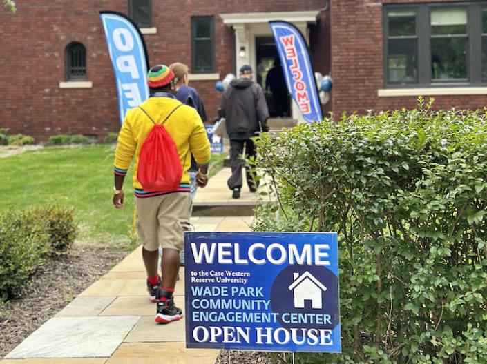 People coming into the Wade Park CEC Open House