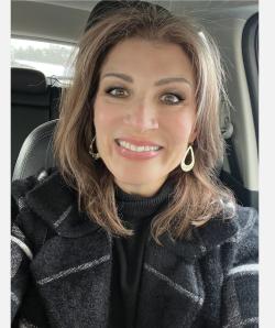Samantha Steinberg smiles at camera