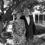 Black and white image of Janet and Russell Kittel standing under a tree