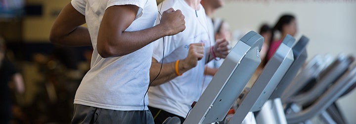 Students exercising on treadmills