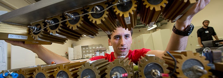 Student working on a gear project at Sears think[box]