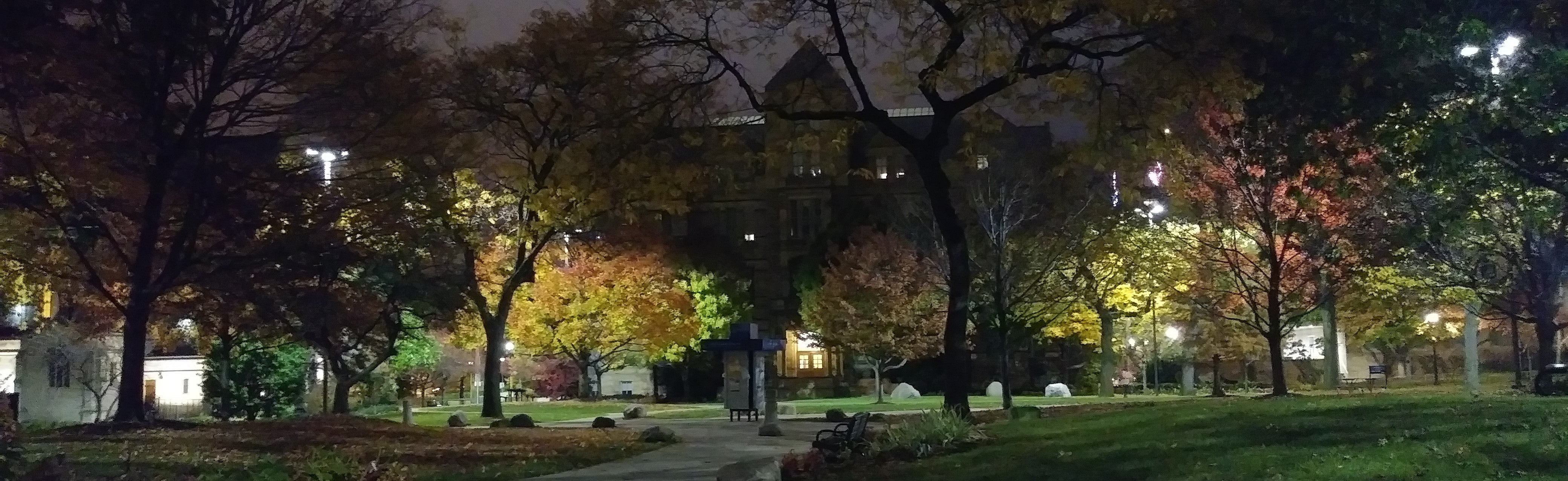 Banner of Quad in Front of Adelbert Hall at Night in Autumn