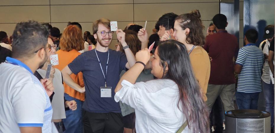 New students use playing cards as part of a diversity exercise at fall 2023 orientation