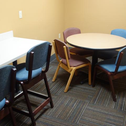 Taplin House Study Room with table, chairs, and bar stools